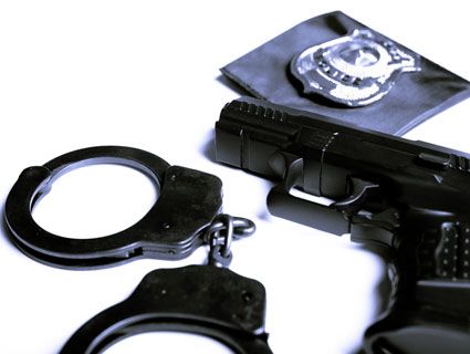 gun and handcuffs