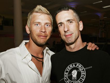 Dan Savage, right, with his husband, Terry Miller