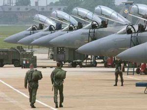 soldiers in front of planes