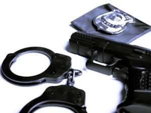 gun and handcuffs