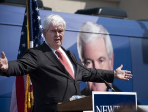 Newt Gingrich making a sweeping gesture