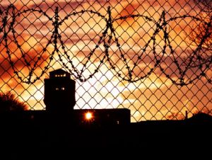 prison barbed wire sunset