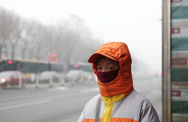 A woman wearing a face mask