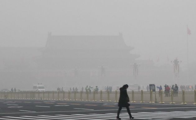 person walking in smog