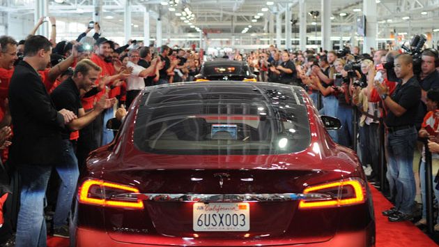 Model S and people cheering