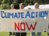 Activists with sign: "climate action now" 