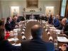 Intelligence leaders around a table