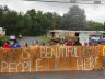 Residents and volunteers form a barricade at Riverdale Mobile Homes Park in Jers