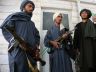 former Taliban insurgents with weapons