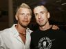 Dan Savage, right, with his husband, Terry Miller