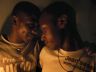 A couple at a gay bar in Kampala.